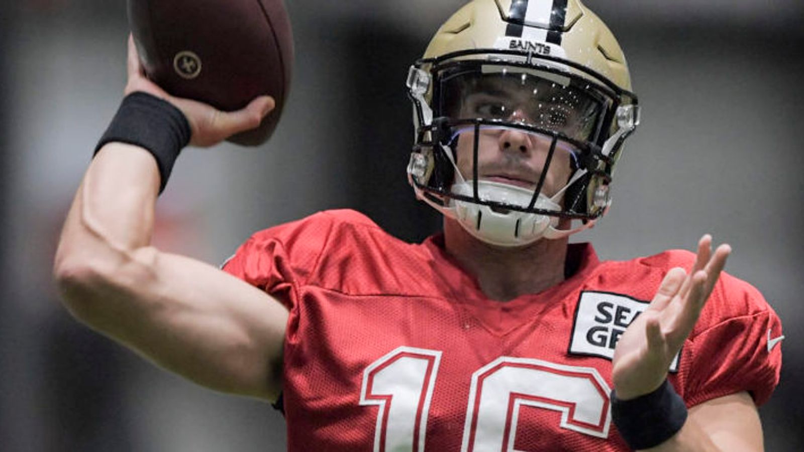 New Orleans Saints quarterback Ian Book (16) looks to pass during