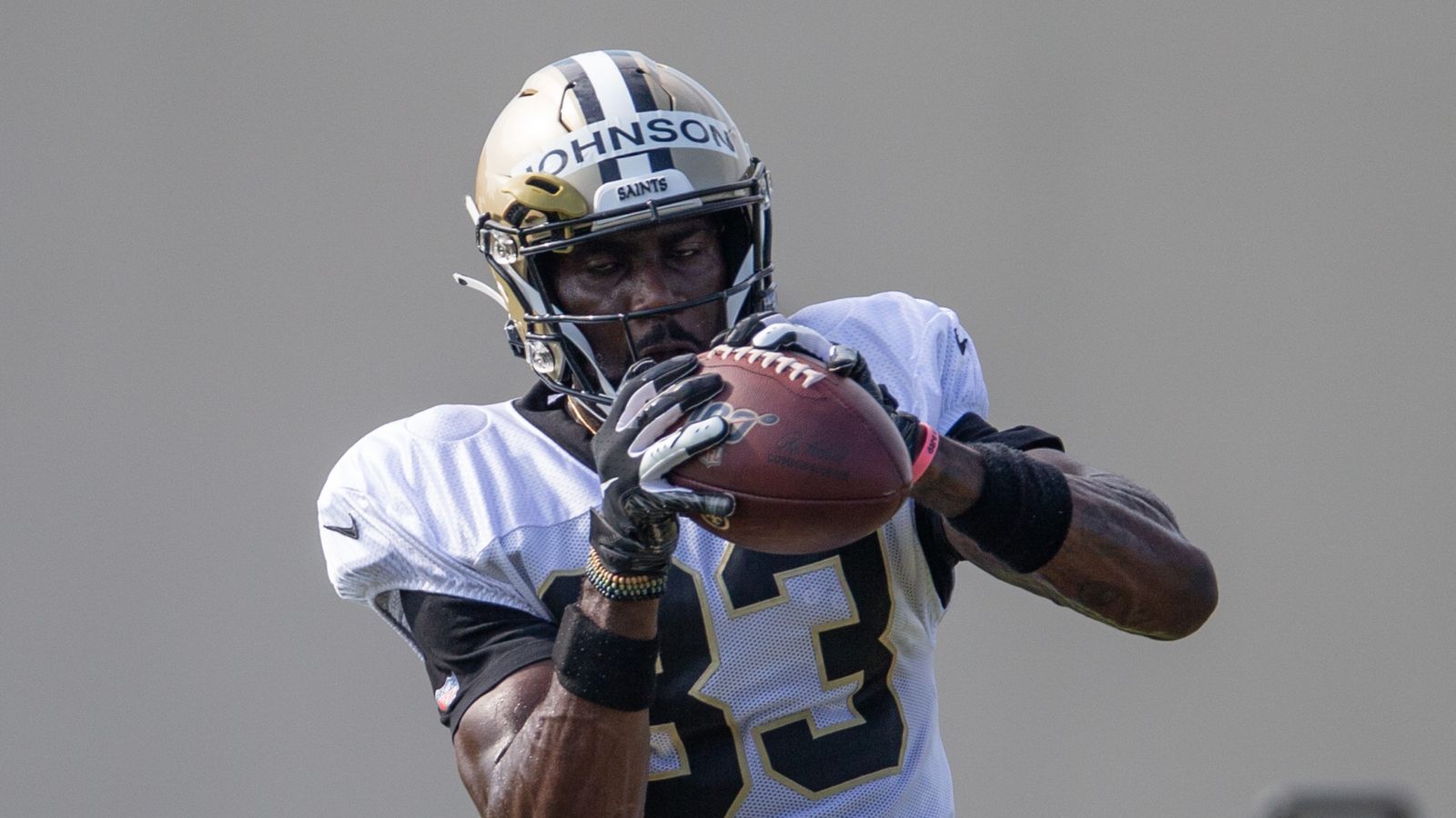 New Orleans Saints tight end Juwan Johnson (83) is tackled by San Francisco  49ers cornerback Deommod