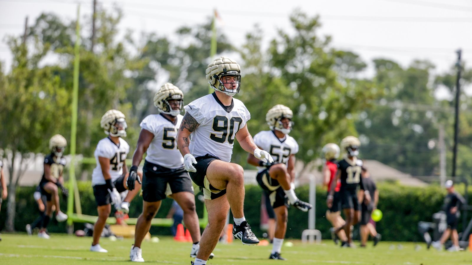 New Orleans Saints defensive end Payton Turner plays defense